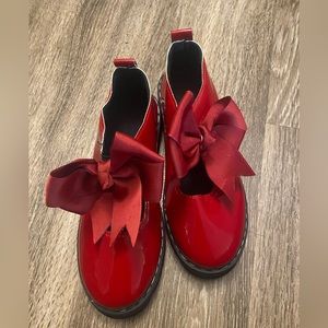 Red shoes with bow